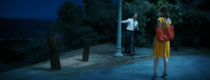 Help me find Emma Stone's red bag in La La Land?