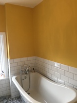 Mustard coloured bedroom walls ...