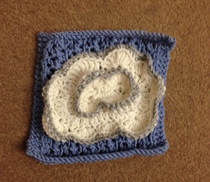 Woolly hugs. We are making a blanket for Zombie’s son and his wife (Zombielad and Zombielass.) lovely crafters and donors, we need your help.