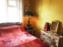 Mustard coloured bedroom walls ...