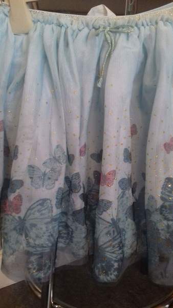 What colour top with this skirt for my little girl?