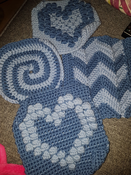 Woolly hugs. We are making a blanket for Zombie’s son and his wife (Zombielad and Zombielass.) lovely crafters and donors, we need your help.