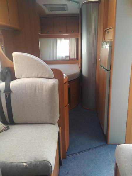 We have a motor home!! & what is an inverter & do we need one?