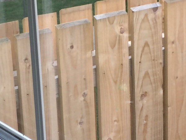 Would it be possible/very awkward to fit trellis to this kind of fence?