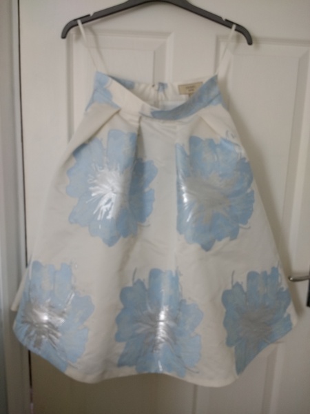 Help me find a top to go with this skirt. Wedding guest