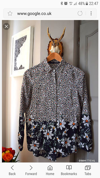 How do I care for a Zara daisy print silk blouse?