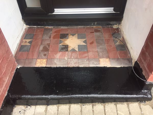 Old tiles (original) on doorstep of London Victorian House- is there anything I can do to restore them?