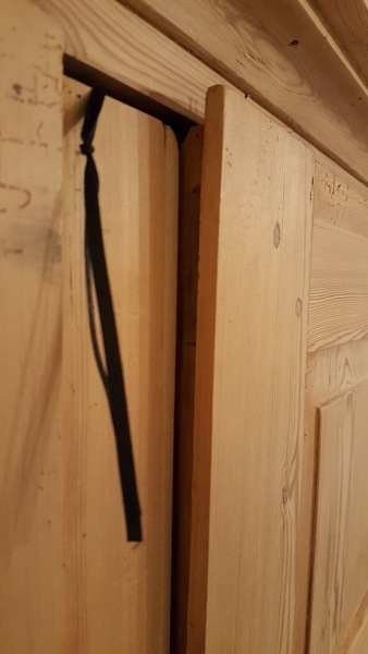 How to unwarp an antique wardrobe door?