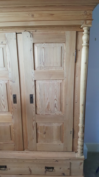 How to unwarp an antique wardrobe door?