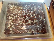 Glueing minecraft square shapes to the top of a chocolate cake?