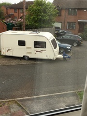 Caravan and van parking in front of my house - AIBU