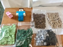 Glueing minecraft square shapes to the top of a chocolate cake?