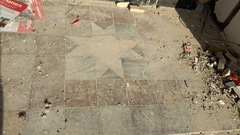 Old tiles (original) on doorstep of London Victorian House- is there anything I can do to restore them?