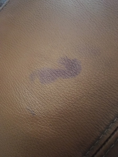 Juice stain on leather sofa
