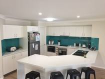 Avoiding a long narrow corridor from front to back of house
