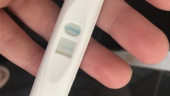 Positive pregnancy test.