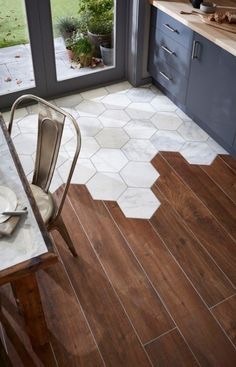 Extending/transitioning wooden flooring in extension?