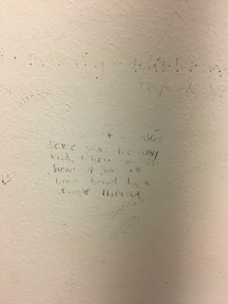 To ask you to help me decipher this Waitrose graffiti