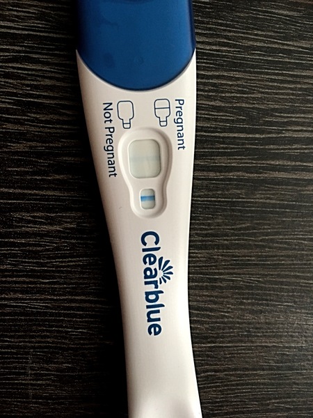 Pregnancy tests with faint lines.