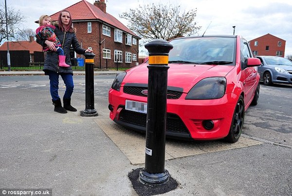 Neighbours have 'made' a driveway which MY parking space blocks