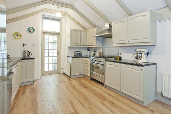 Show me your before and after pictures of painting kitchen cupboards???