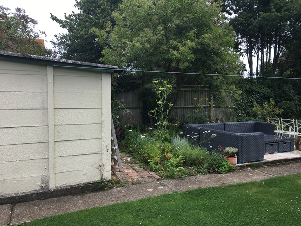 Dark grey masonry paint