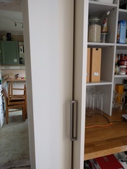 Slide and hide doors for utility room