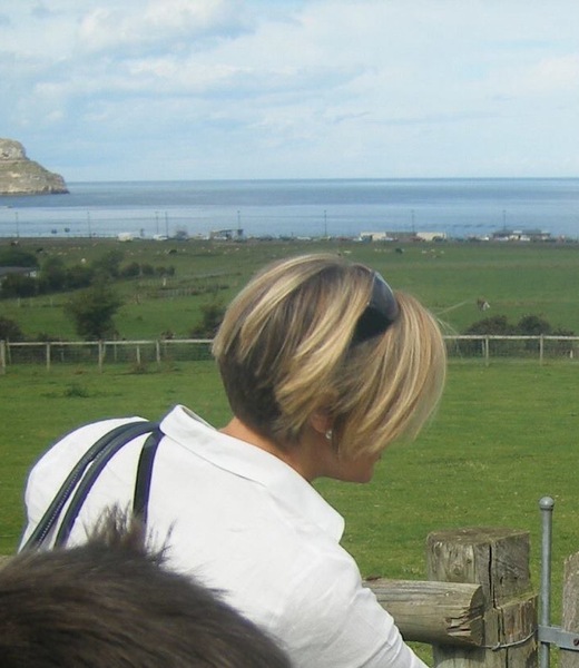 Short hair on woman over 40.