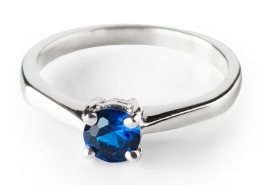 Anyone seen an engagement style ring in SILVER with a blue sapphire or black diamond?