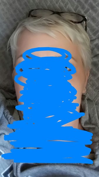 Short hair on woman over 40.