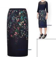 I love this skirt but I'm not sure what to wear it with