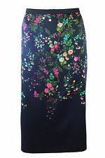 I love this skirt but I'm not sure what to wear it with
