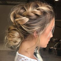 Hair 'updo' too much for a wedding guest?