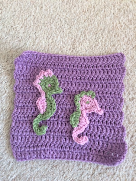 Woolly Hugs. Remembering Joseph, we are making a blanket for Trazzletoes and family, can you help?