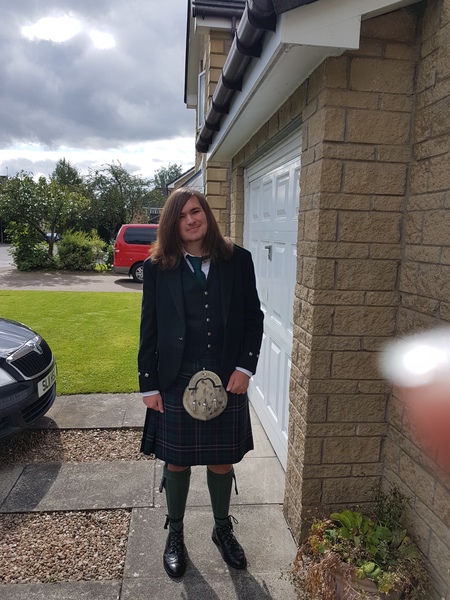 Large man sized 16 year old boy with very long hair - wedding outfit!
