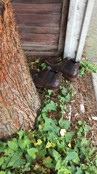 Wierd shoes left outside house?