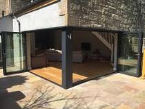 planning to install a corner bifold door with a permanent steel post