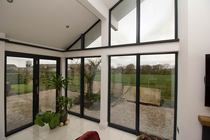 planning to install a corner bifold door with a permanent steel post