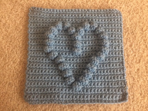 Woolly Hugs. Photos of the finished Blanket for CatThiefKeith's family and a message from her DH now on this original thread. TITLE EDITED BY MNHQ
