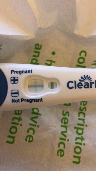 Am worried. Very faint line, 2 days late.