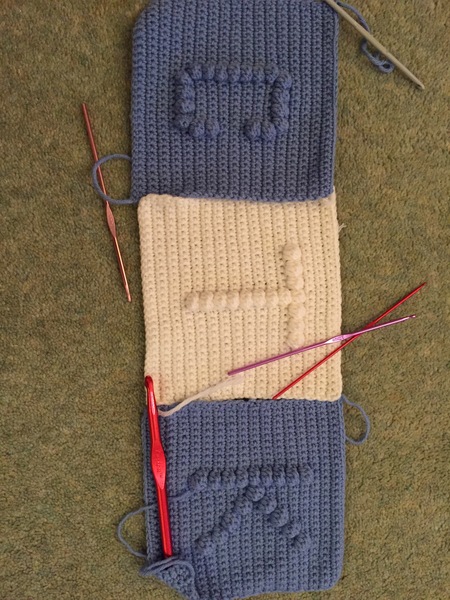 Woolly Hugs. Photos of the finished Blanket for CatThiefKeith's family and a message from her DH now on this original thread. TITLE EDITED BY MNHQ