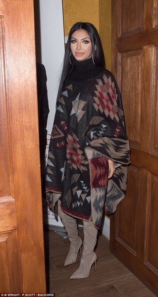 Where can I get a cape/poncho like this one? (Amir Khan’s wife)
