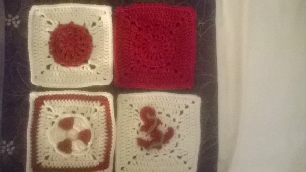 Woolly Hugs. Photos of the finished Blanket for CatThiefKeith's family and a message from her DH now on this original thread. TITLE EDITED BY MNHQ