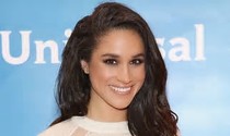Am I the only person who thinks that Meghan looks a lot like Pippa?
