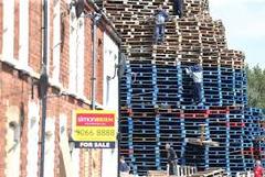 My neighbour has built a bonfire in the garden