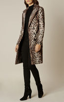 Leopard print coat mid 40's - a bit Bet Lynch?