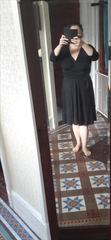 HELP how to dress up this black dress i look like am going to a funeral.