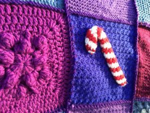 Woolly hugs. We are making a blanket for Zombie’s son and his wife (Zombielad and Zombielass.) lovely crafters and donors, we need your help.
