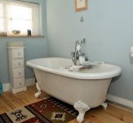 Do I REALLY need to tile around bath if no shower? Wisdom needed!