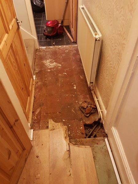 Floor ruined by mystery damp - advice please!